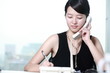 Photo: young asian business woman writing something young asian business woman writing something