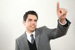 Junger Mann Business zeigt mit dem Finger