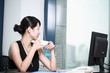 young asian businesswoman working with computer in office