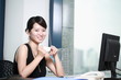 young asian businesswoman working with computer in office