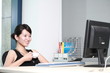 young asian businesswoman working with computer in office