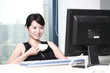 young asian businesswoman working with computer in office