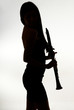 shadow of a woman clarinet player
