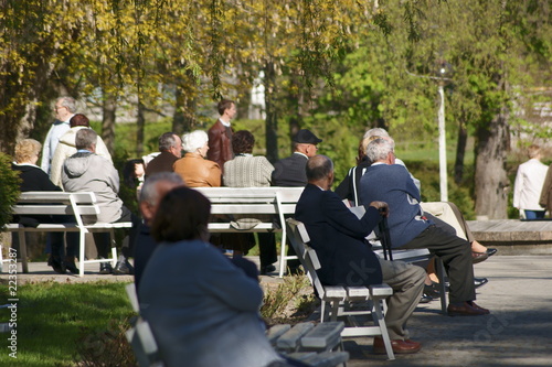 Photo: senior people on spa park bench senior people on spa park bench