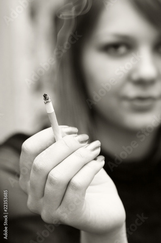 Photo: Woman with cigarette Woman with cigarette
