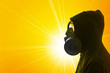 Man in hoody with gas mask