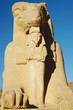 Statue Of a Queen Protected By A Sphinx