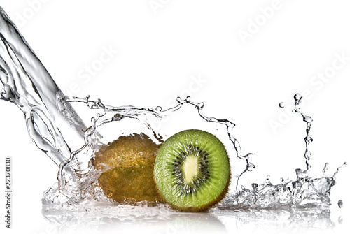 Photo: Water splash on kiwi isolated on white Water splash on kiwi isolated on white