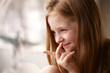 smiling girl looking at window smiling girl looking at window