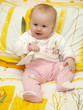 The small smiling girl.