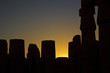 Statues Silhoutted Like Chess Pieces Against The Sunset