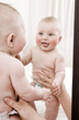 Cute Baby Looking in the Mirror