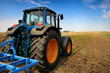 The Tractor - modern farm equipment in field