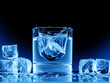 Close up view of the glass and ice cubes on black