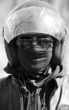 Close up portrait of racer in helmet on sunglasses Close up portrait of racer in helmet on sunglasses