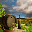 White wine with old wine barrel on background of vineyard