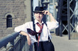 Woman at hat on bridge