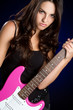 Teen Girl Playing Guitar