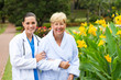 Photo: young doctor helping senior patient young doctor helping senior patient