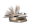 pile of books and eyeglasses pile of books and eyeglasses