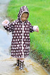 Child Playing in Rain