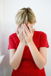 Photo: Woman hiding face Woman hiding face