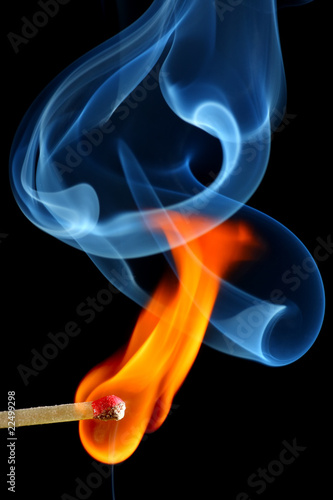 Photo: Match bursting to flame Match bursting to flame
