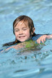 Photo: Young girl swimming Young girl swimming