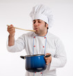 Male cook with casserole