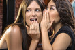 Woman telling secrets