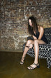 Foto: Young woman texting on phone Young woman texting on phone