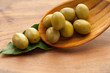 green olives over the spoon green olives over the spoon