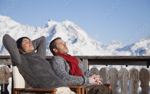 Photo: Young couple enjoying winter sun Young couple enjoying winter sun