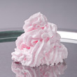 Photo: Whipped cream on a metal plate with reflection Whipped cream on a metal plate with reflection