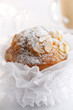 pompous almond muffin and coffee on background pompous almond muffin and coffee on background