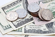 coins on dollars background