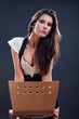 Attractive young woman leaning on the chair