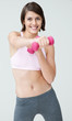 Fitness woman working out with a dumbbell against white