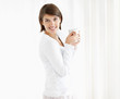 Refreshment - Pretty young woman drinking coffee