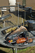 Roast meat on rustic barbecue