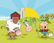 Male Farmer Tending To His Cattle On His Farm