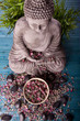 Photo en ligne au meilleur prix Buddha mit Bambus, Massage Steinen und Schale mit Bl�ten