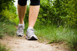Woman walking cross country and trail Woman walking cross country and trail