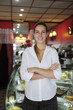 small business: proud female owner of a cafe