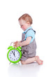 Cute little boyl with the clock
