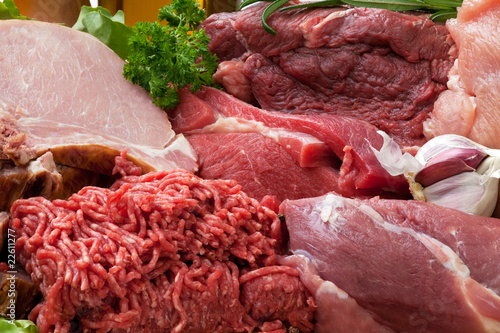Photo: assorted raw meats background assorted raw meats background