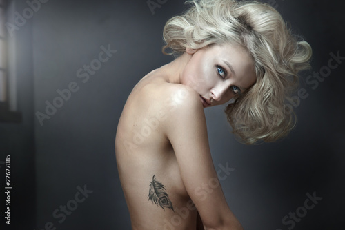 Photo: Beautiful nude blonde beauty with tatoo Beautiful nude blonde beauty with tatoo