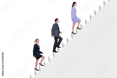 Photo: Business people climbing stairs Business people climbing stairs