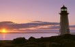 historic peggy's cove lighthouse at sunset