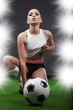 Sexy football player on stadium